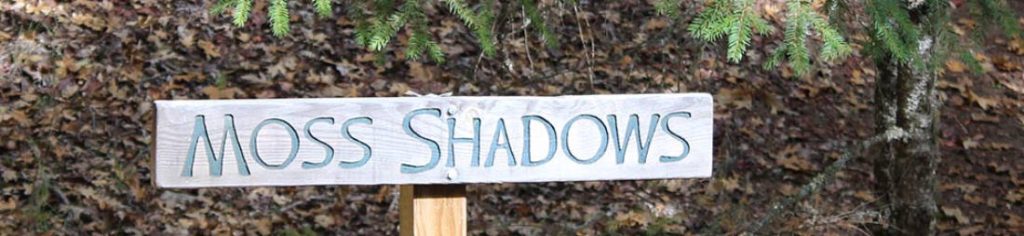 Moss Shadows campsite sign.