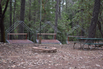 Sky High fire ring, flagpole & tent platforms in the background.