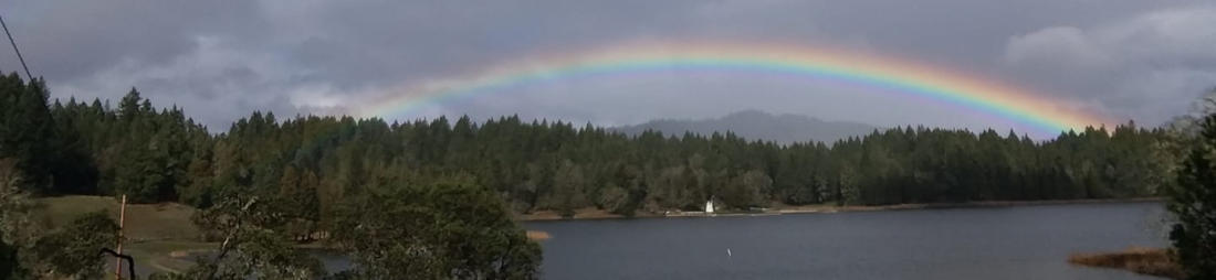 Rainbow arching over Wente Scout Reservation looking towards Waterfront from Staff Camp.